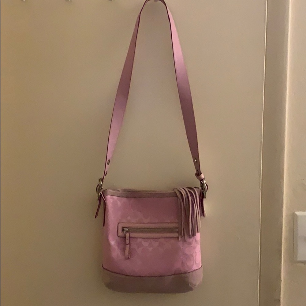 A Coach bag. Crossbody strap.